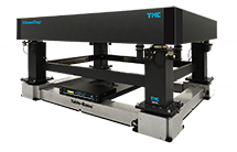 Hybrid optical table vibration isolation system